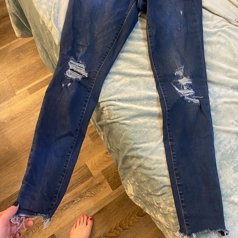 High waisted distressed jean